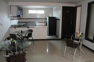 Kuchyň nebo kuchyňský kout v ubytování Hotel Dorado Plaza Bogota