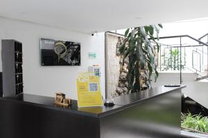 TV a/nebo společenská místnost v ubytování Hotel Dorado Plaza Bogota