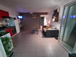 TV o dispositivi per l'intrattenimento presso Antilo - appartement proche mer