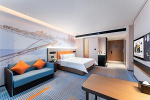 Postel nebo postele na pokoji v ubytování Hampton by Hilton Guangzhou Jinshazhou + 30 fotografií