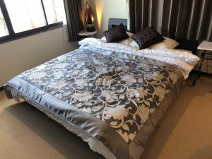 Posteľ alebo postele v izbe v ubytovaní Cool-inn Otaru