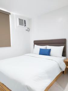 Posteľ alebo postele v izbe v ubytovaní airobedz MAKATI - A Value Hotel