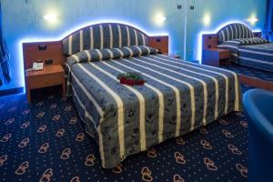 Postel nebo postele na pokoji v ubytování Motel Cuore Gadesco - Hotel - Motel - Cremona - CR