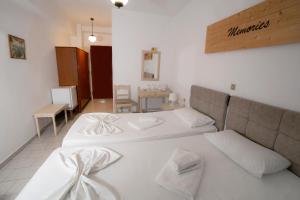 Postel nebo postele na pokoji v ubytování Κastro Ηotel
