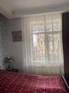 Postel nebo postele na pokoji v ubytování Madoyan Guest house