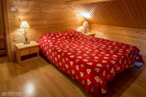 Tempat tidur dalam kamar di LE QUARTZ DES HAUTES-VOSGES