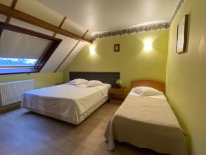 Postel nebo postele na pokoji v ubytování Hotel In Den Hoek