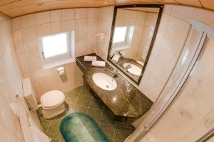 Vannituba majutusasutuses Apartpension Kappacher