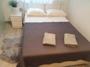 Postel nebo postele na pokoji v ubytování Miriam Rooms Zadar