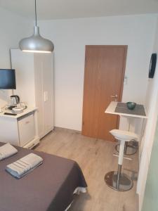 Kuchyň nebo kuchyňský kout v ubytování Miriam Rooms Zadar