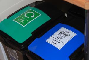 two blue and green cards on top of a parking meter at King Street Apartment in Inverness