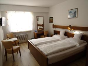 Katil atau katil-katil dalam bilik di Aparthotel Zum Dom
