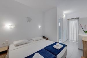 Cama ou camas em um quarto em Makis Place