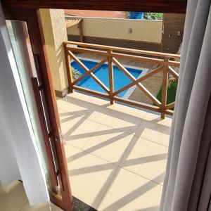 En balkong eller terrasse på AP PRAIA Camocim