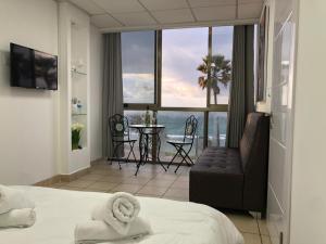 Ліжко або ліжка в номері Sea Line Hotel From R&A Group