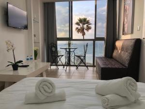 Ліжко або ліжка в номері Sea Line Hotel From R&A Group