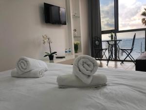Ліжко або ліжка в номері Sea Line Hotel From R&A Group