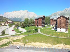 an aerial view of a city with a mountain at Haut Alpin Superdévoluy in Superdevoluy