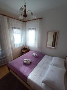 Postel nebo postele na pokoji v ubytování Apartman Nada
