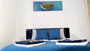 Postel nebo postele na pokoji v ubytování Ocean View Apartments