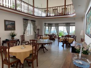 A restaurant or other place to eat at Beau Séjour Hotel