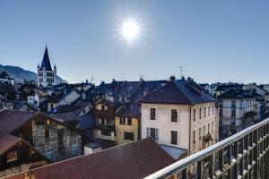 a view of a city from a balcony at Le Balcon Annécien 4 - rooftop view for 2-4 people in Annecy