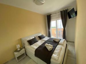 Postel nebo postele na pokoji v ubytování Villa Diana