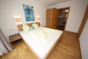 Posteľ alebo postele v izbe v ubytovaní Appartement Viktoria