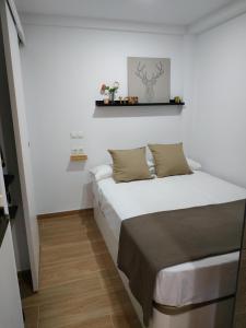 Posteľ alebo postele v izbe v ubytovaní Apartamento La Caló