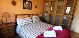 Postel nebo postele na pokoji v ubytování Apartamento La Alcancía