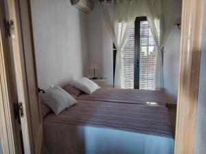Postel nebo postele na pokoji v ubytování Ferienhaus Casa Ela Pedro - Hinojos 4 Zi - 8 Betten, Kinder Willkommen