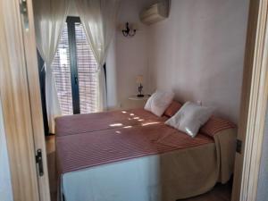 Postel nebo postele na pokoji v ubytování Ferienhaus Casa Ela Pedro - Hinojos 4 Zi - 8 Betten, Kinder Willkommen