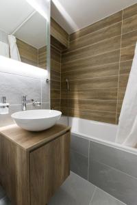 Koupelna v ubytování Appartements dans la Résidence Panorama