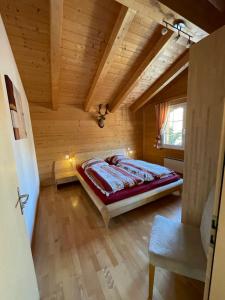 Voodi või voodid majutusasutuse Chalet Inge toas