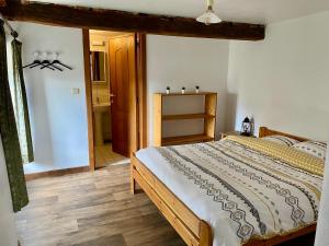 Postel nebo postele na pokoji v ubytování Gîte Wibrin