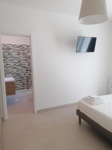 Posteľ alebo postele v izbe v ubytovaní Residence Chanel