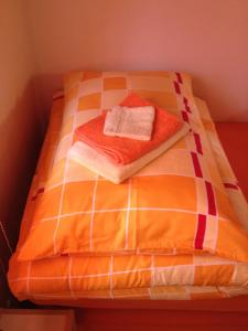 Uma cama ou camas num quarto em Casa Aurora