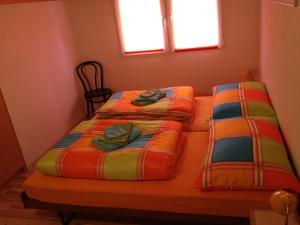 Uma cama ou camas num quarto em Casa Aurora
