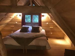 Postel nebo postele na pokoji v ubytování Ferme Boisquillon