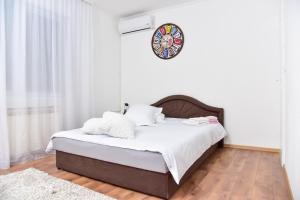 מיטה או מיטות בחדר ב-Apartmani Koko