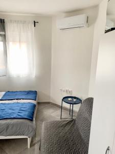 Krevet ili kreveti u jedinici u okviru objekta Studio Apartman Bruna-Liznjan, Medulin