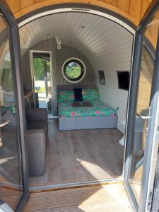 Postel nebo postele na pokoji v ubytování Seren Garden Pod