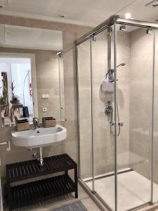 Ένα μπάνιο στο Penthouse Los Arqueros golf