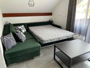 Postel nebo postele na pokoji v ubytování Apartmán D5 Nová Pec