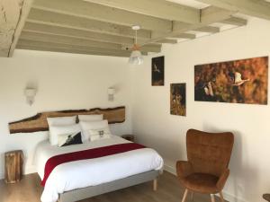 Postel nebo postele na pokoji v ubytování Ferme Boisquillon
