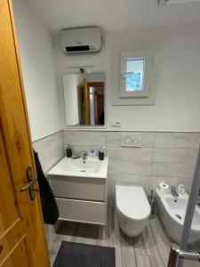 A bathroom at Appartamento Ca' Baci'