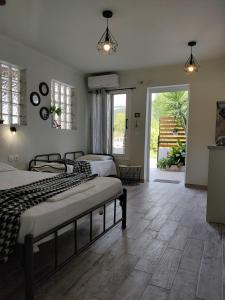 Postel nebo postele na pokoji v ubytování Villa Margarita