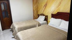 Cama ou camas em um quarto em Hotel La Casona Real