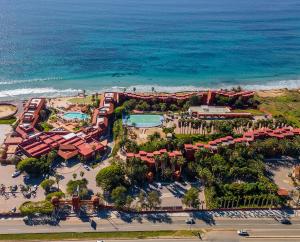 an aerial view of a resort near the ocean at Puerto Nuevo Baja Hotel & Villas in Rosarito