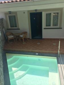 Bazén v ubytování La Pineta Hotel Beach & Spa nebo v jeho okolí